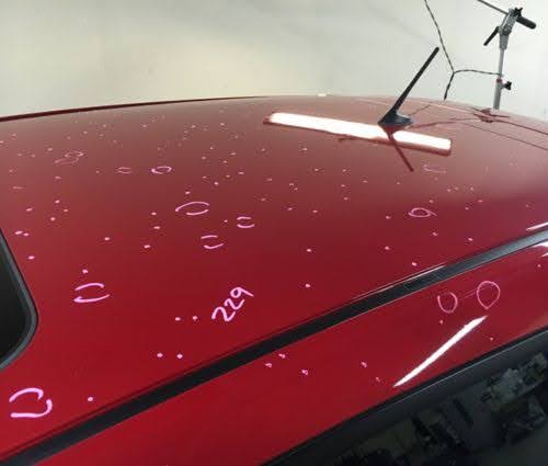 Hail damage vehicle assessment