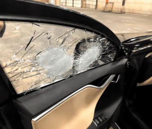 Paintless dent removal technician